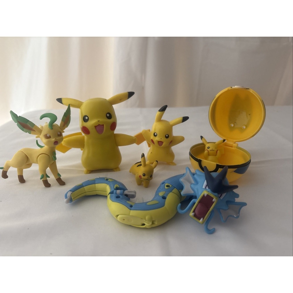 Pokemon Figures Lot of 7 Pikachu Leafeon Gyarados and Pokemon Ball Toy Set